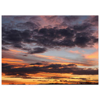 A dramatic Prekmurje sky opening in vivid orange pink and blue sunset colors above a dark quiet horizon — BETVA fine art nature poster