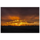 Fiery orange sunset burning beneath dark violet clouds with bare tree silhouettes along the Prekmurje horizon — BETVA fine art nature poster