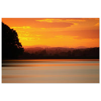 Golden orange sunset over a still lake with layered mountain and hill silhouettes in Prekmurje Slovenia — BETVA fine art nature poster