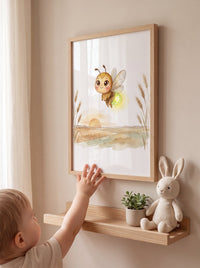 Toddler reaching toward a framed BETVA firefly watercolor print in a calm oak-and-beige nursery
